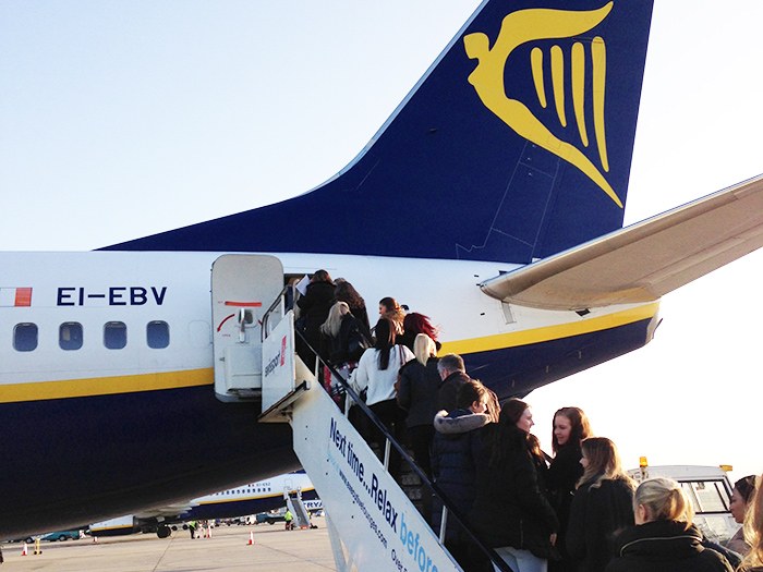 Students board their Ryanair flight